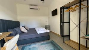 TV a/nebo společenská místnost v ubytování Grande Maldives Inn