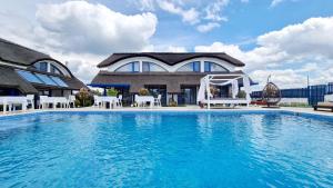 Swimmingpoolen hos eller tæt på Complex Turistic Casa Anastasia