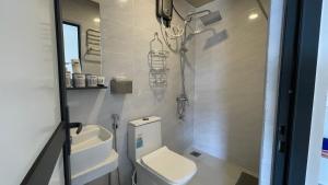 Koupelna v ubytování Grande Maldives Inn