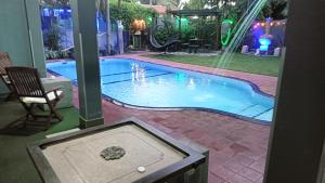Πισίνα στο ή κοντά στο Palms Villa