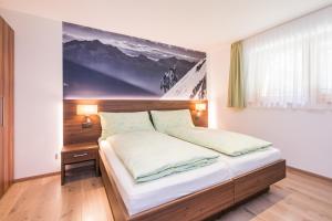 Postel nebo postele na pokoji v ubytování Ferienhaus Casa Luna