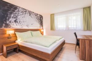 Postel nebo postele na pokoji v ubytování Ferienhaus Casa Luna