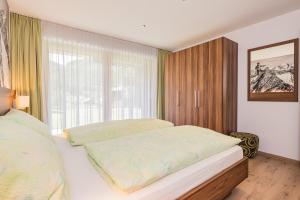 Postel nebo postele na pokoji v ubytování Ferienhaus Casa Luna