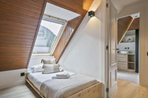 Postel nebo postele na pokoji v ubytování Luderna - Apartamento Mirador Bonaigua