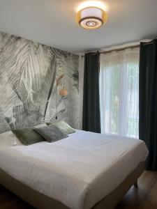 Postel nebo postele na pokoji v ubytování Villa Simone