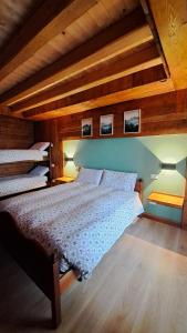 Postel nebo postele na pokoji v ubytování B&B Val Maschi