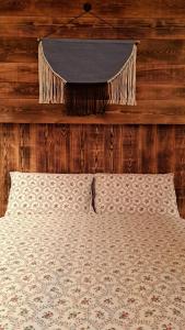 Postel nebo postele na pokoji v ubytování B&B Val Maschi
