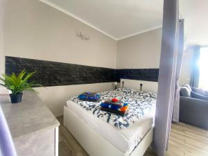 Ένα ή περισσότερα κρεβάτια σε δωμάτιο στο Sissy Tenerife Apartman +18 φωτογραφίες