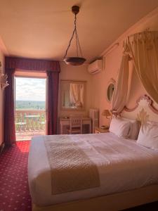 Postel nebo postele na pokoji v ubytování Quattro Gigli Hotel
