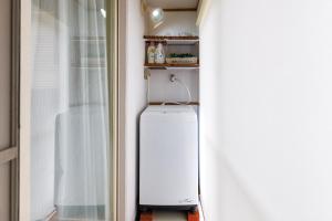 駐車場2台 海中道路や伊計島にアクセス良好 和室付き 最大5名宿泊施設 Guest house mum的厨房或小厨房