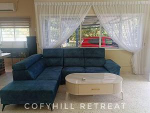 Posezení v ubytování CofyHill Retreat
