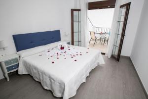 Posteľ alebo postele v izbe v ubytovaní Hostal Boutique Bajamar