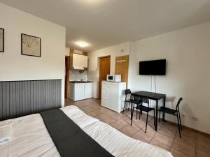 Kuchyň nebo kuchyňský kout v ubytování Simple Apartman + 13 fotografií