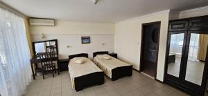 Postel nebo postele na pokoji v ubytování Hotel Klisura
