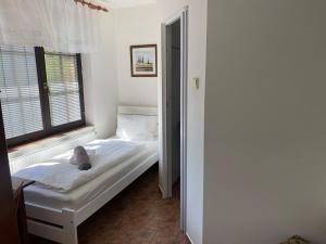 Postel nebo postele na pokoji v ubytování Penzion Janata