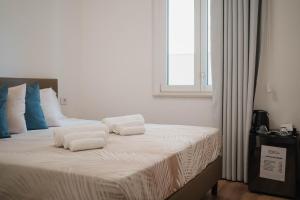 Letto o letti in una camera di Hotel Ficocella