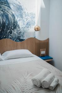 Letto o letti in una camera di Hotel Ficocella