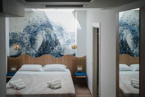 Letto o letti in una camera di Hotel Ficocella