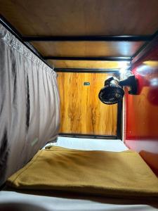 Ένα ή περισσότερα κρεβάτια σε δωμάτιο στο Lucky Dormitory