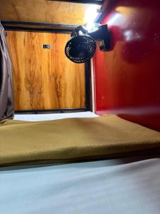 Ένα ή περισσότερα κρεβάτια σε δωμάτιο στο Lucky Dormitory