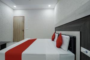 Postel nebo postele na pokoji v ubytování HOTEL O PRIME ROSE