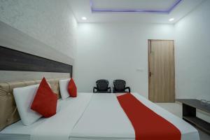 Postel nebo postele na pokoji v ubytování HOTEL O PRIME ROSE