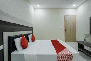 Postel nebo postele na pokoji v ubytování HOTEL O PRIME ROSE
