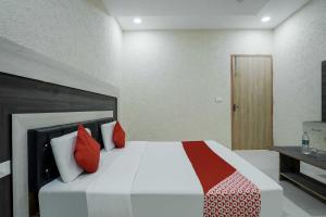 Postel nebo postele na pokoji v ubytování HOTEL O PRIME ROSE