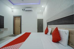 Postel nebo postele na pokoji v ubytování HOTEL O PRIME ROSE