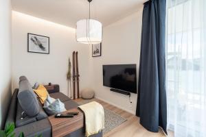 TV a/nebo společenská místnost v ubytování Endemit Apartment