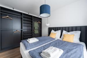 Postel nebo postele na pokoji v ubytování Endemit Apartment