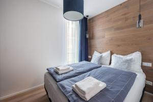 Postel nebo postele na pokoji v ubytování Endemit Apartment