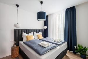 Postel nebo postele na pokoji v ubytování Endemit Apartment + 17 fotografií