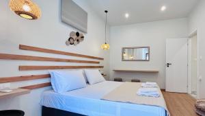 Postel nebo postele na pokoji v ubytování Eria's Junior Suite