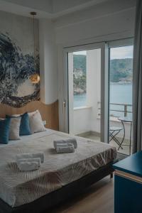 Postel nebo postele na pokoji v ubytování Hotel Ficocella