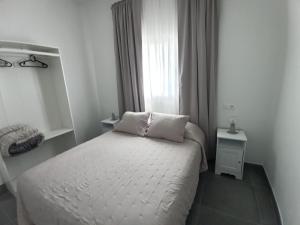 Katil atau katil-katil dalam bilik di Vv Xoaninha