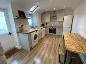 Köök või kööginurk majutusasutuses Foundry cottage