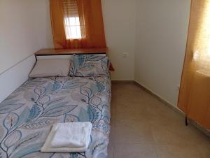 Ένα ή περισσότερα κρεβάτια σε δωμάτιο στο TenTen Apartments