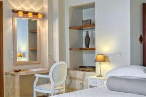 Ein Bett oder Betten in einem Zimmer der Unterkunft Mare Monte Luxury Suites