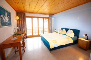Rooms Haltenegg客房内的一张或多张床位