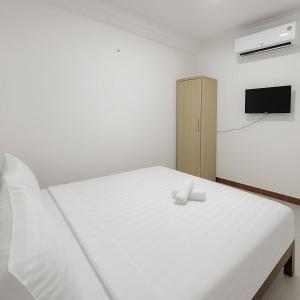 Postel nebo postele na pokoji v ubytování K&T Hotel - Bùi Viện Walking Street