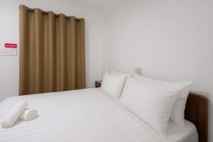 Postel nebo postele na pokoji v ubytování K&T Hotel - Bùi Viện Walking Street
