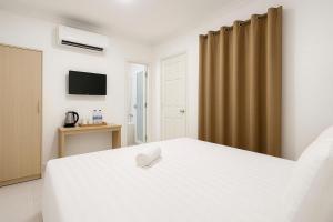 Postel nebo postele na pokoji v ubytování K&T Hotel - Bùi Viện Walking Street