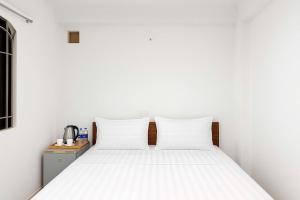 Postel nebo postele na pokoji v ubytování K&T Hotel - Bùi Viện Walking Street