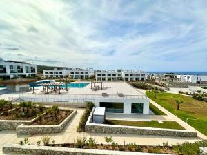 Φωτογραφία από το άλμπουμ του The Olive Beachfront Apartment & Spa σε Kalogrea