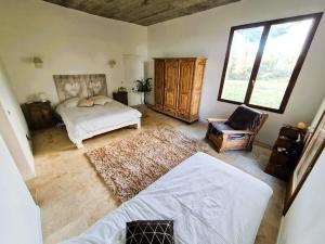 Postel nebo postele na pokoji v ubytování Maison - chambres d'hotes