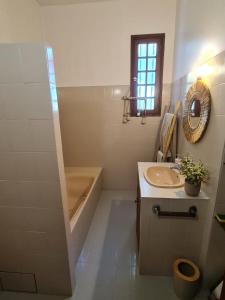 Koupelna v ubytování Maison - chambres d'hotes + 9 fotografií