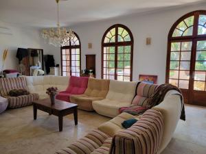 Posezení v ubytování Maison - chambres d'hotes