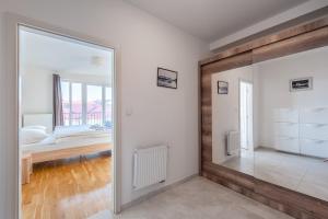 Posteľ alebo postele v izbe v ubytovaní Sunny Safron apartment