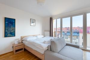 Posteľ alebo postele v izbe v ubytovaní Sunny Safron apartment